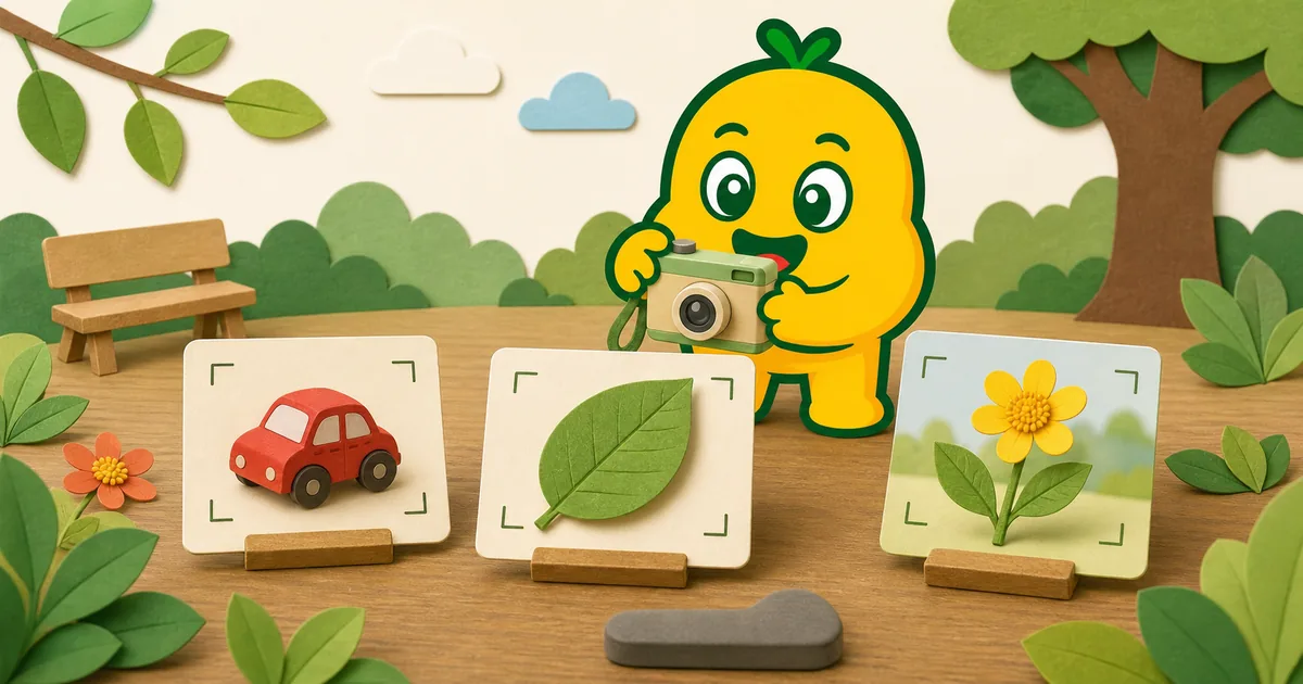 ミニカー、葉、花を中央に分かりやすく写したカードを撮影するKORENANIのキャラクター